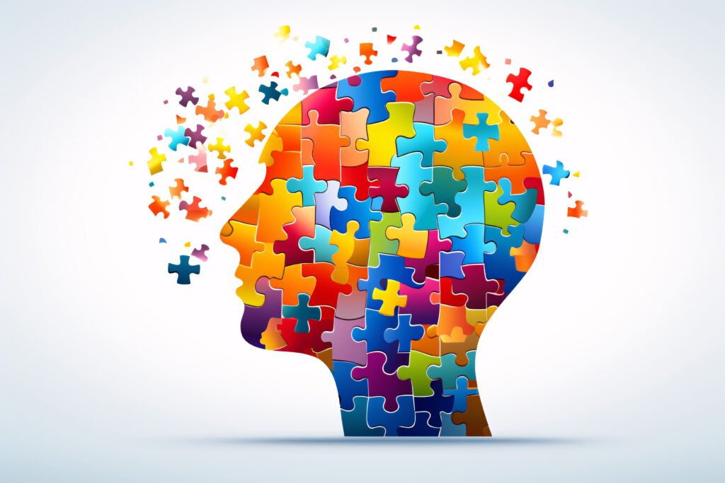 Colorful puzzle pieces in the outline of a head, depicting the concept of neurodiversity, autism spectrum disorder (ASD) or ADHD